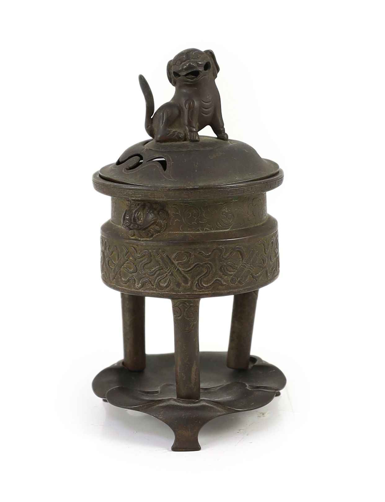 A Chinese bronze tripod censer, ding, Xuande mark, 18th/19th century, with associated cover and stand, 9.5 cm diameter
